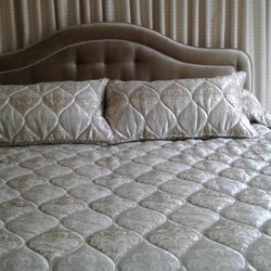 Dreamhouse Draperies - Lockport home...Custom bedding and headboard with Drapery wall behind
