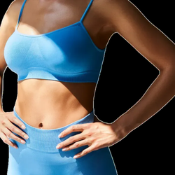 Comprehensive Medical Weight Loss - A close-up image showcases a fit woman wearing coordinated blue athletic activewear, including a sports bra and high-waisted ...