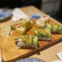 sushi on a wooden board
