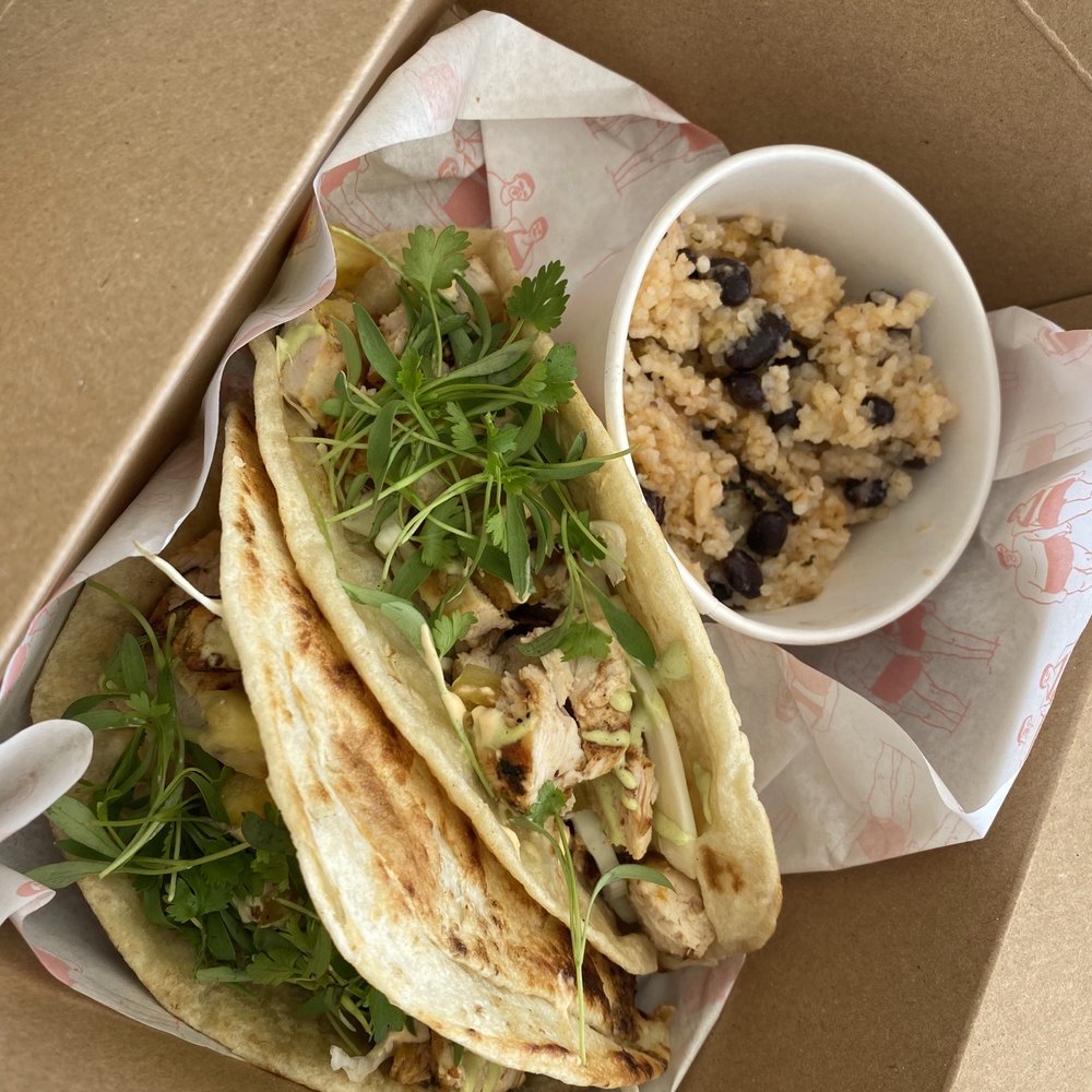 Whitney's - Chicken tacos with grilled pineapples and parantha bread - Bars Near Me - Longboat Key, Florida Whitney's - Chicken tacos with grilled pineapples and parantha bread - Bars Near Me - Longboat Key, Florida