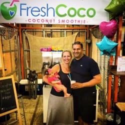 Fresh Coco - Happy customers enjoying the refreshing flavor of a 100% Natural Coconut Smoothie at -Fresh Coco-