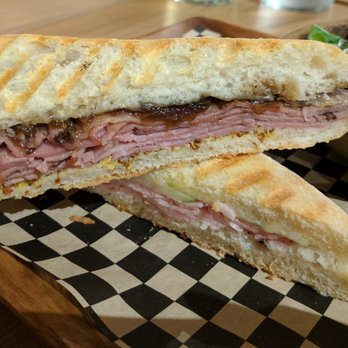 Camp 4  - half of a french dip and half of a porchetta panini - each full sandwich is $12 - Wine Bars Near Me - Modesto, California