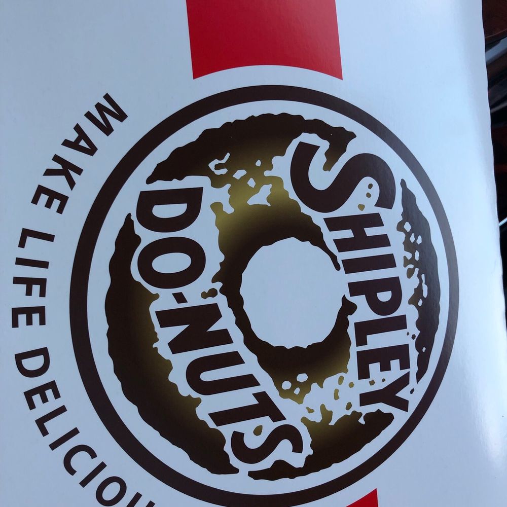 a donut shop sign a donut shop sign
