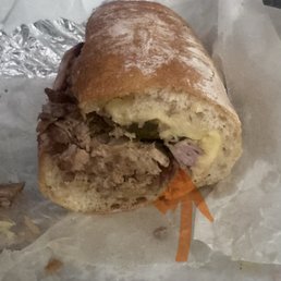 My "Cuban" and my tiny bit of ham smushed into one side. My "Cuban" and my tiny bit of ham smushed into one side.