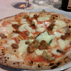 Le Magnolie - pizza boscaiola, con funghi porcini e salsiccia fresca