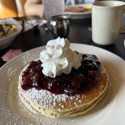 Rowlett Cafe - Blueberry Pancakes with Chicken Fried Chicken, two eggs & Hash-browns