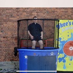 Okee's Amusements - This is the Priest who hit his head. The place you have to hit (with your own balls!) isn't even in the middle of the bullseye!