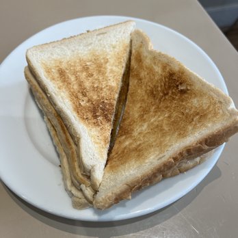 Raffles - toast with butter - Cafes Near Me - London, XGL