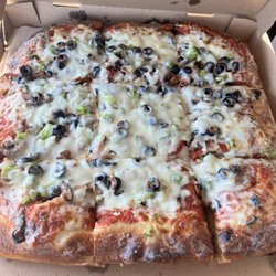 Corner Slice Pizzeria - Large deep dish supreme, can't remember the name exactly