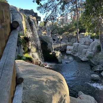 Knott's Berry Farm - Camp Snoopy waterfall at golden hour - Amusement Parks Near Me - Buena Park, California Knott's Berry Farm - Camp Snoopy waterfall at golden hour - Amusement Parks Near Me - Buena Park, California