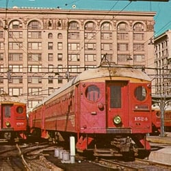 Cole's French Dip - Back of building - tracks were built over the street and trains came in on 2nd floor. Vast expanse of plaster now covers garage.