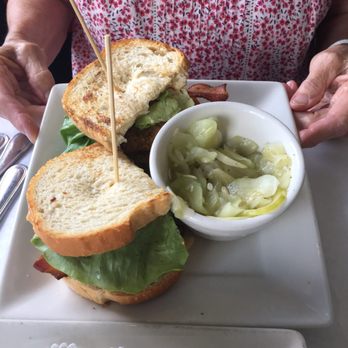 Coastal Kitchen - Fried green tomato sandwich with marinated cucumbers and onion - Seafood Near Me - Saint Simons Island, Georgia