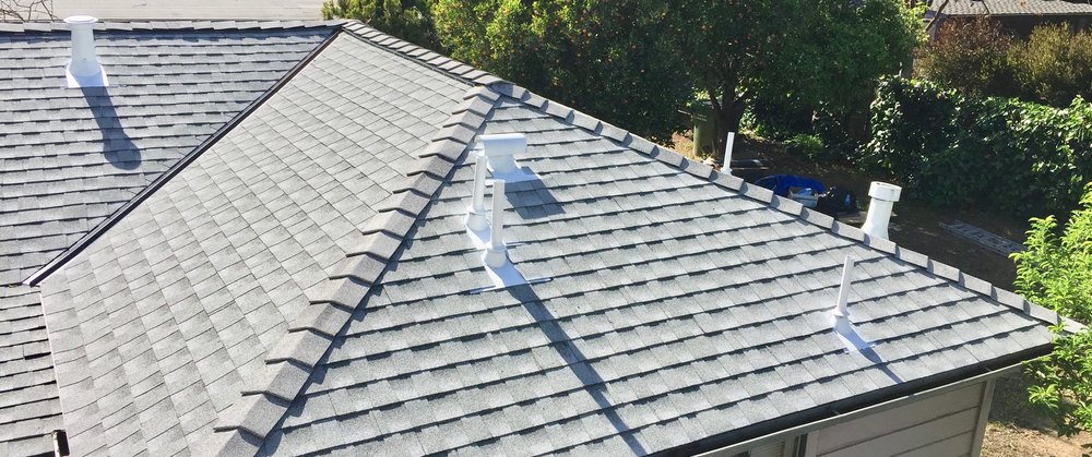 Slide of Economy Roofing