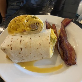 Scratch Kitchen & Cocktails - Brunch Burrito subbed potatoes for bacon. - New American Near Me - Norman, Oklahoma Scratch Kitchen & Cocktails - Brunch Burrito subbed potatoes for bacon. - New American Near Me - Norman, Oklahoma