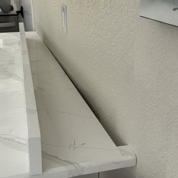 Everlasting Surfaces - Poor measurement by their people = awkward 1 1/4 piece added - Countertop Installation Near Me - Livermore, California