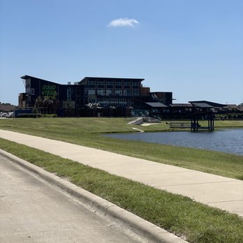 The Cove at BearX - a view of a lake and a building - Swimming Pools Near Me - College Station, Texas The Cove at BearX - a view of a lake and a building - Swimming Pools Near Me - College Station, Texas