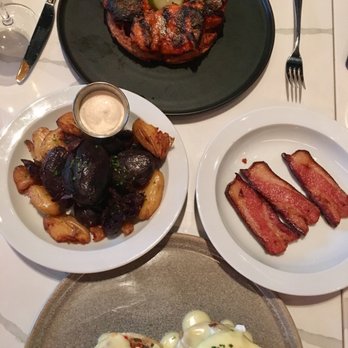 the Albert - Peri peri chicken and waffles, potato side dish, braised bacon and duck confit benedict - New American Near Me - Chicago, Illinois the Albert - Peri peri chicken and waffles, potato side dish, braised bacon and duck confit benedict - New American Near Me - Chicago, Illinois