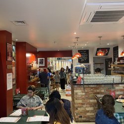Mamma Mia Pizzeria - Front room and back room seating!