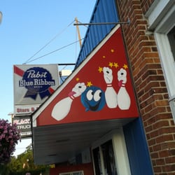 Stars and Strikes - Hand painted awning at entrance to Stars and Strikes.