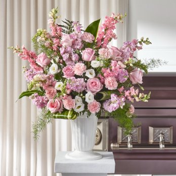 Ruth’s Roses - I was promised a larger version of this because I paid for the deluxe arrangement. - Floral Designers Near Me