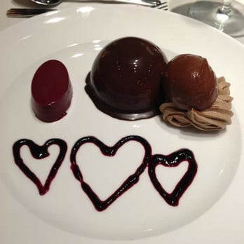 Elevation - Chocolate three ways with huckleberry sauce. - New American Near Me - Bend, Oregon