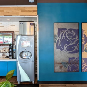 QDOBA Mexican Eats - This is a view of the Coke Freestyle Machine and other art on the wall. Photo taken September 13, 2022. - Mexican Near Me - Norfolk, Virginia QDOBA Mexican Eats - This is a view of the Coke Freestyle Machine and other art on the wall. Photo taken September 13, 2022. - Mexican Near Me - Norfolk, Virginia
