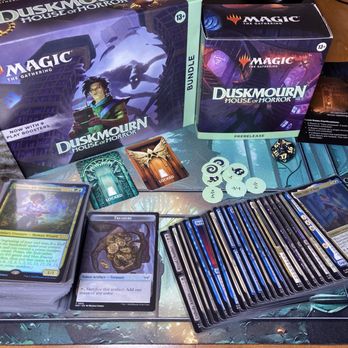 The Battleground Cafe - My loot at the MTG Duskmourn prerelease. - Hobby Shops Near Me - White Bear Lake, Minnesota The Battleground Cafe - My loot at the MTG Duskmourn prerelease. - Hobby Shops Near Me - White Bear Lake, Minnesota