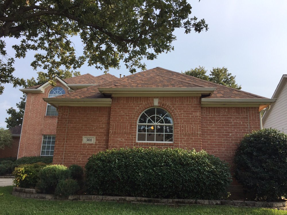 Slide of Triumph Roofing