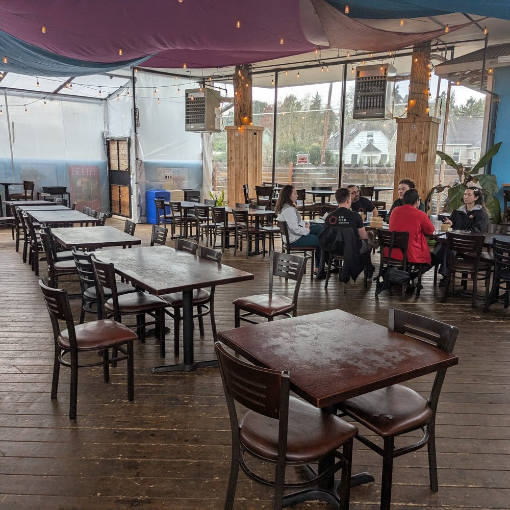 Bongos - Enclosed Gas Station Area Seating - Cuban Near Me - Seattle, Washington Bongos - Enclosed Gas Station Area Seating - Cuban Near Me - Seattle, Washington