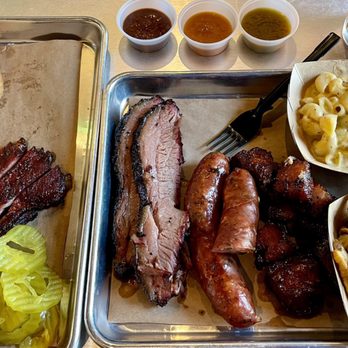 Heim Barbecue - Pork ribs, beef brisket, jalapeño sausage, bacon burnt ends, jalapeño mac & cheese, and fries. - Barbeque Near Me - Dallas, Texas Heim Barbecue - Pork ribs, beef brisket, jalapeño sausage, bacon burnt ends, jalapeño mac & cheese, and fries. - Barbeque Near Me - Dallas, Texas