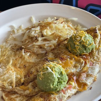 Lone Star Cafe - Omelette with raw center and cold hash browns. Photographs greeeeat though  server was extremely apologetic, not his fault obvi - Breakfast & Brunch Near Me - Arlington, Texas