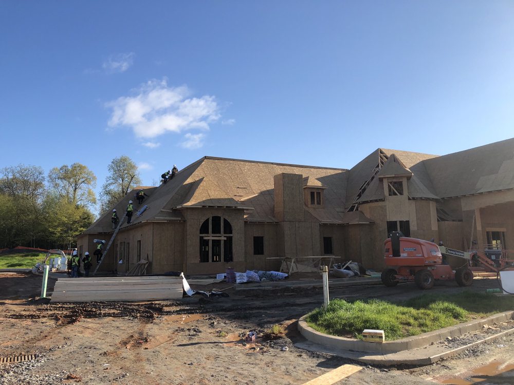 Slide of Academy Roofing