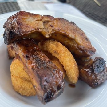 Stanford's - Happy Hour Ribs with Onion Rings - American Near Me - Hillsboro, Oregon Stanford's - Happy Hour Ribs with Onion Rings - American Near Me - Hillsboro, Oregon