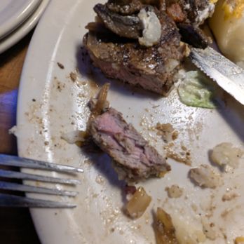 Texas Roadhouse - 16 oz window-selected ribeye steak supposedly cooked "rare" (cold center). This one was "medium-well". - Steakhouses Near Me - Yuma, Arizona