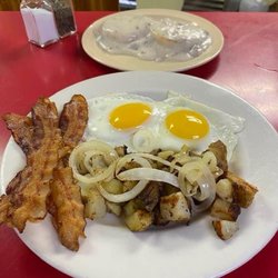Jo's Place - Bacon, sunny side up done perfectly, lots of onions in those home fries and sausage gravy the way you want it.
