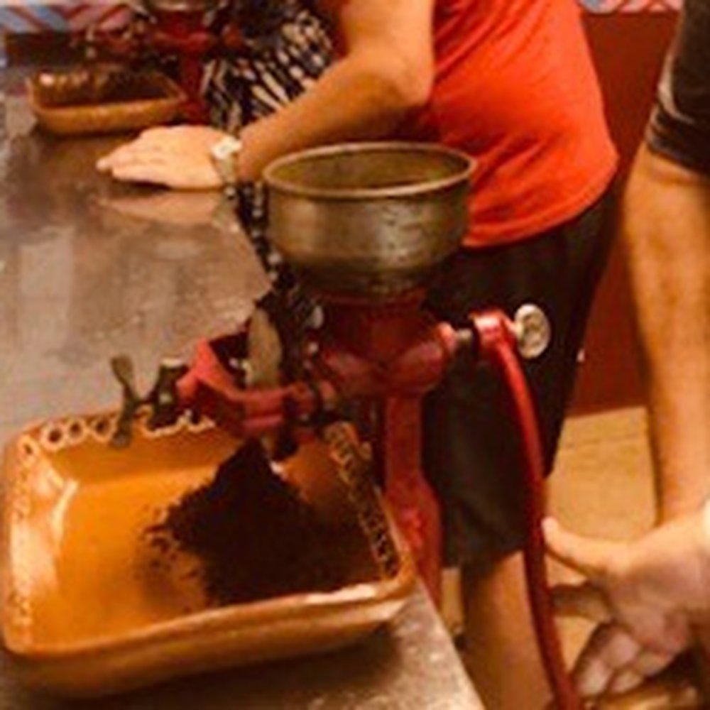 Discover Mexico - Grinding cacao beans to make our own chocolate. - Amusement Parks Near Me - Cozumel, ROO Discover Mexico - Grinding cacao beans to make our own chocolate. - Amusement Parks Near Me - Cozumel, ROO