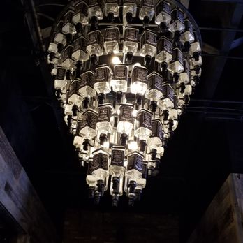 Lucky Bastard Saloon - Jack Daniels bottle chandelier - Sports Bars Near Me - Nashville, Tennessee