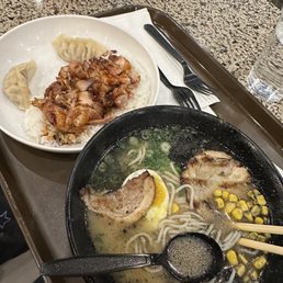 Ramen and kids chicken plate (1 potsticker already eaten) Ramen and kids chicken plate (1 potsticker already eaten)