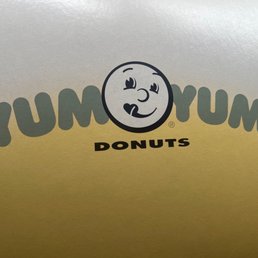 a donut with a smiley face a donut with a smiley face