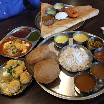 Shiv Sagar - Puri chaat (left), samosa chaat (top left), dosa combination (top right), and Thali (bottom left). All so good!!!! - Indian Near Me - Houston, Texas Shiv Sagar - Puri chaat (left), samosa chaat (top left), dosa combination (top right), and Thali (bottom left). All so good!!!! - Indian Near Me - Houston, Texas
