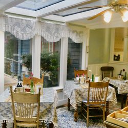 The Old St Angela Inn - Dining area in the Solarium .