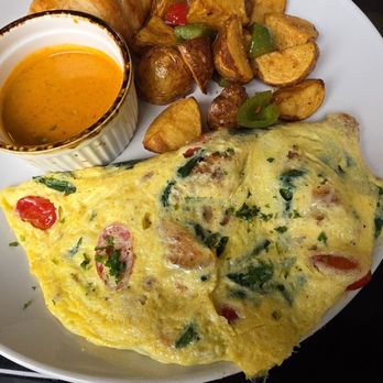 Whisk Breakfast & Brunch - Cajun Omelette with potatoes - Breakfast & Brunch Near Me - East Point, Georgia Whisk Breakfast & Brunch - Cajun Omelette with potatoes - Breakfast & Brunch Near Me - East Point, Georgia