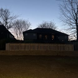Razorline Concrete & Land Services - Retaining wall with fence to add a playground. Sorry for the photo quality, it's sundown.