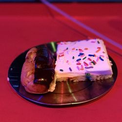 Medieval Times Dinner & Tournament - Piece of birthday cake and a soggy coco puff-like pastry