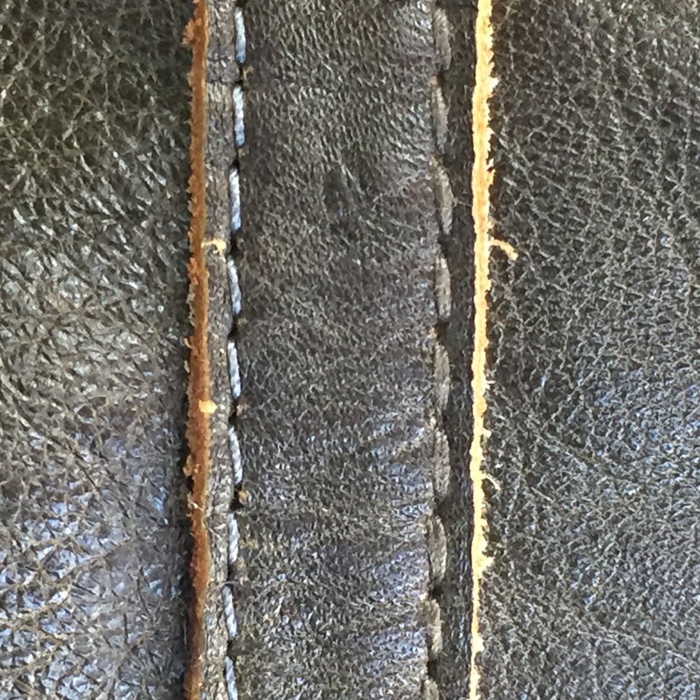 Brown thread was the original. The grey was their 'closest match'. Not even close. Brown thread was the original. The grey was their 'closest match'. Not even close.