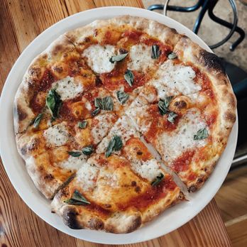Pizzeria Toro - San Marzano tomatoes, basil, and Buffalo mozzarella pizza. - Pizza Near Me - Durham, North Carolina