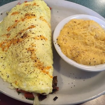 Brother Juniper's - My Meat & Cheese Omelette & cheese grits! - Breakfast & Brunch Near Me - Memphis, Tennessee Brother Juniper's - My Meat & Cheese Omelette & cheese grits! - Breakfast & Brunch Near Me - Memphis, Tennessee