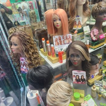 Optima Beauty Supply - Close up of a few wigs. - Cosmetics & Beauty Supply Near Me - New York, New York Optima Beauty Supply - Close up of a few wigs. - Cosmetics & Beauty Supply Near Me - New York, New York