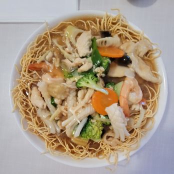 Lemonleaf Grill - Fried noodles with calamari, chicken and shrimp - Thai Near Me - Port Jefferson Station, New York Lemonleaf Grill - Fried noodles with calamari, chicken and shrimp - Thai Near Me - Port Jefferson Station, New York