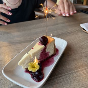 The Kitchen - Cheesecake dessert with sparkler! - Basque Near Me - Penticton, British Columbia